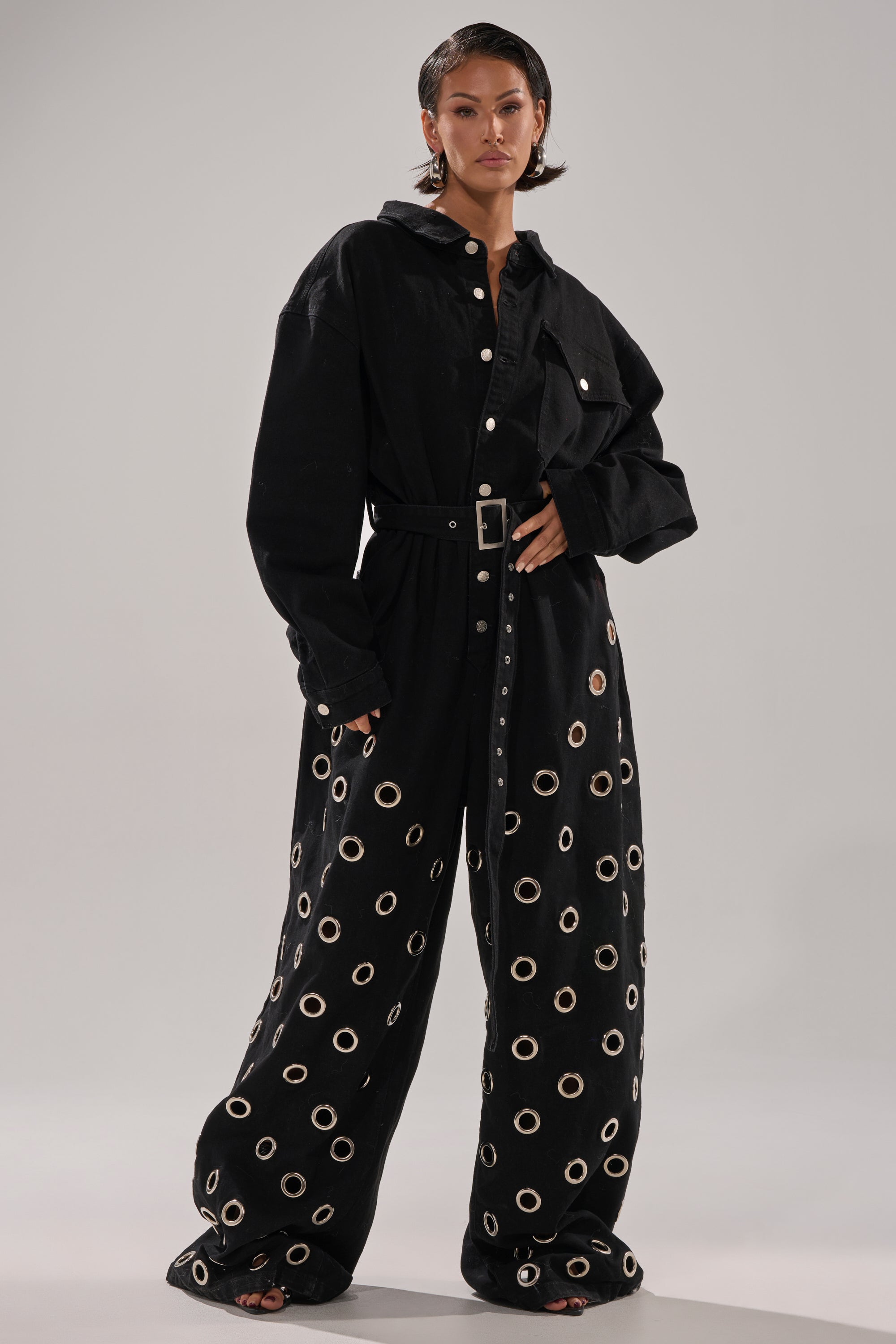 PLAY YOUR CARDS RIGHT DENIM JUMPSUIT WITH GROMMETS