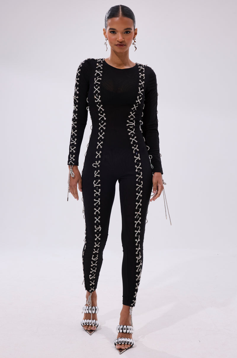 LACE IT UP MESH JUMPSUIT WITH RHINESTONE DETAIL