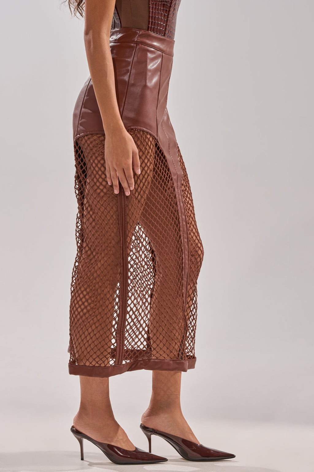 SOMETHING DIFFERENT FAUX LEATHER MIDI SKIRT