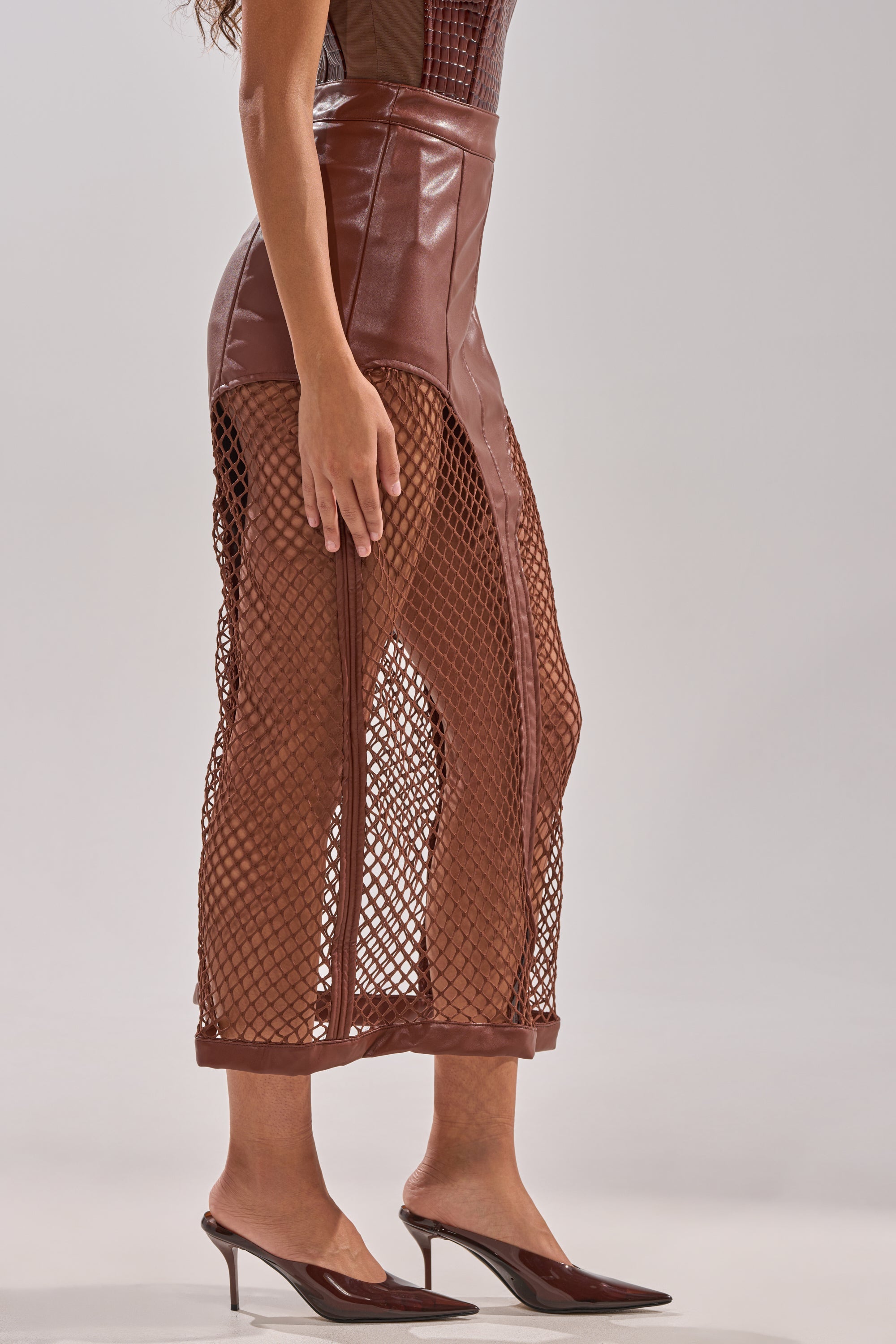 SOMETHING DIFFERENT FAUX LEATHER MIDI SKIRT