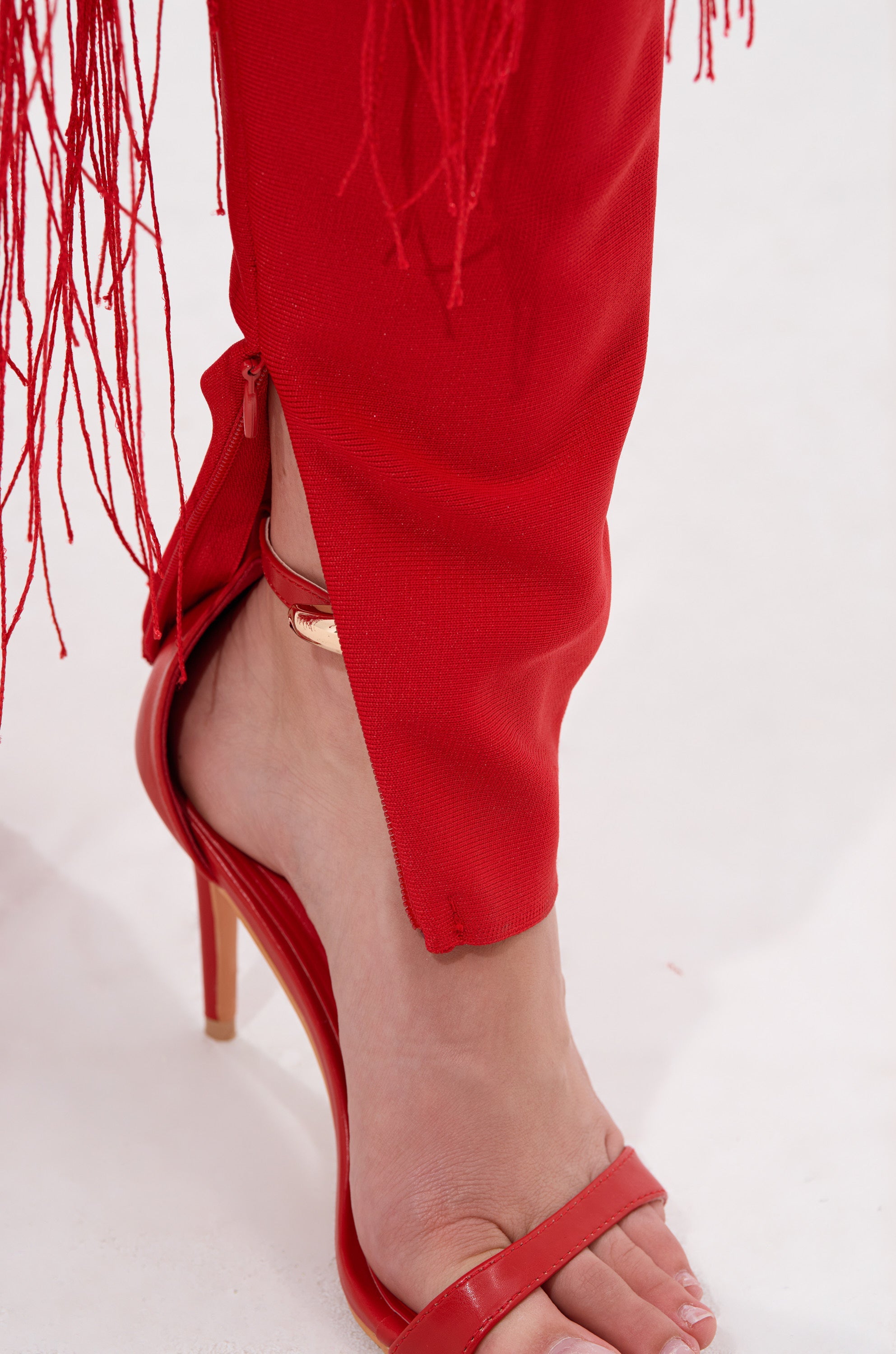 BELLE BANDAGE JUMPSUIT WITH FRINGE