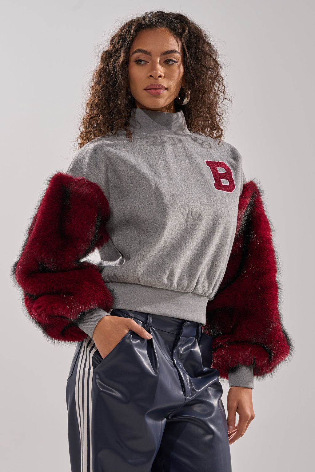 NEW EAST SIDE FAUX FUR SLEEVE SWEATSHIRT