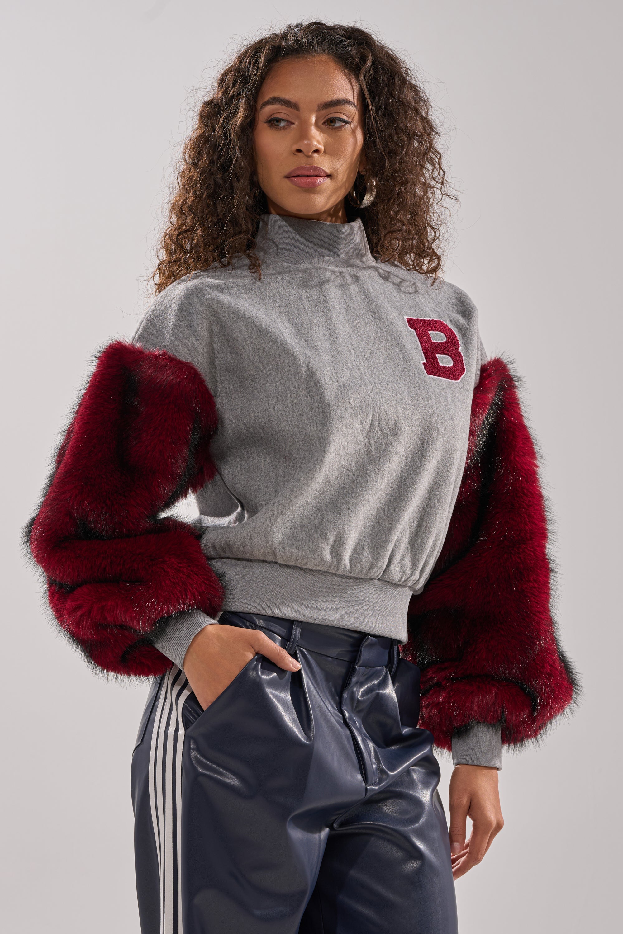 NEW EAST SIDE FAUX FUR SLEEVE SWEATSHIRT