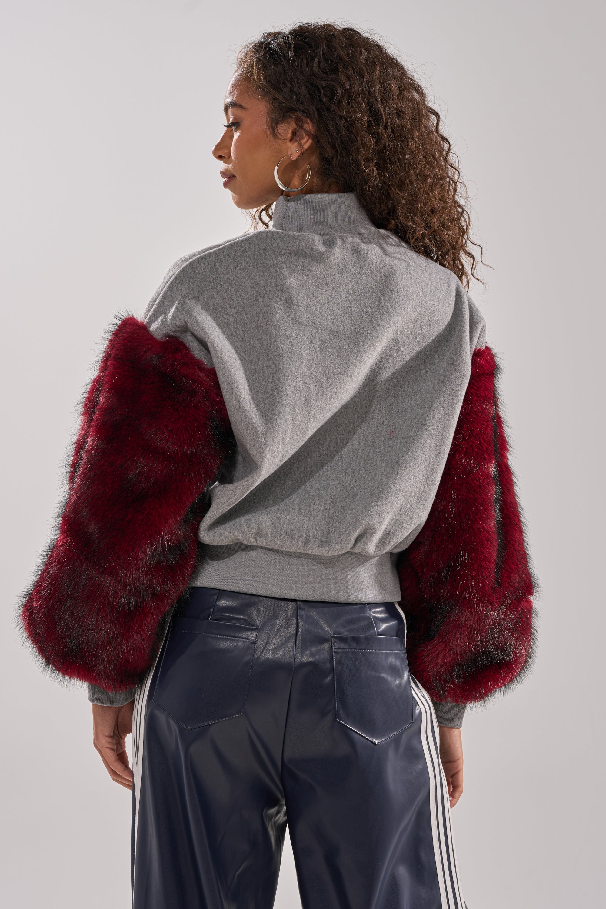 NEW EAST SIDE FAUX FUR SLEEVE SWEATSHIRT