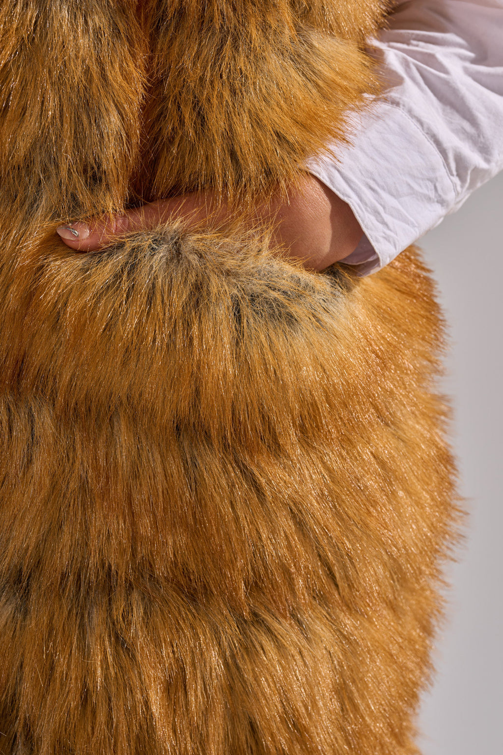 SLY HOODED FAUX FUR VEST