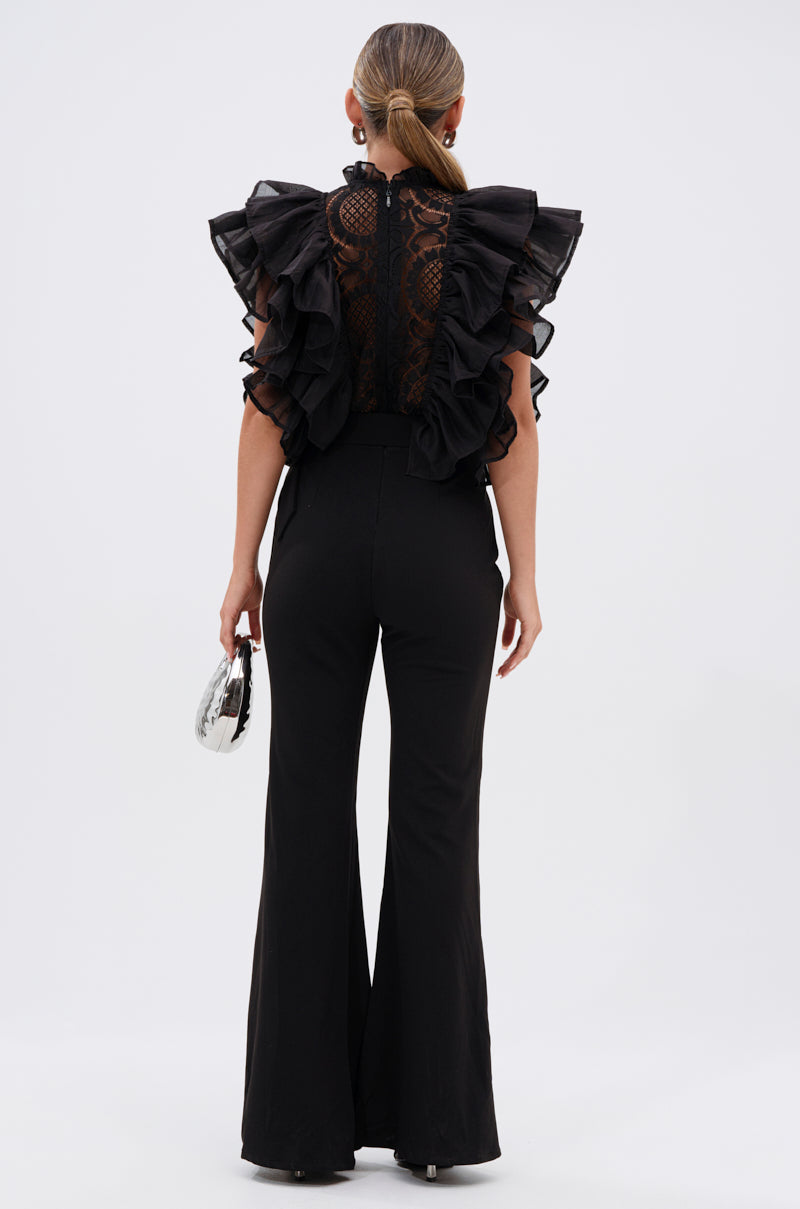 WALK THAT WALK RUFFLE JUMPSUIT IN BLACK